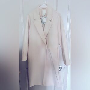 New with tags. Cream long wool blend coat 
H&M 
Woman size xs